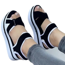 Black and white platform sandals.