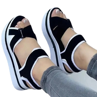 Black and white platform sandals.