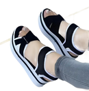Black and white platform sandals.