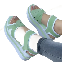 Green platform sandals.