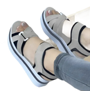 Platform sandals with adjustable straps.