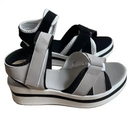 Platform sandals with adjustable straps.