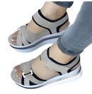 Platform sandals with beige straps.