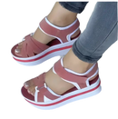 Platform sandals with pink straps.