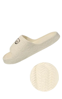 Beige anti-slip textured slipper.