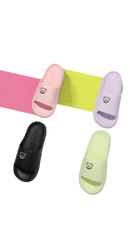 Colorful cartoon-themed slide sandals.