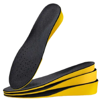 Yellow and black layered shoe inserts.
