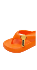 Orange flip-flop with a yellow charm.