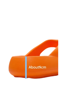 Orange thick-soled sandal.