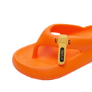 Orange flip-flop with a label.