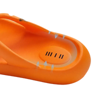 Orange sunken footbed sandal.