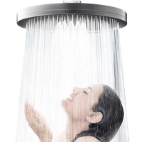 Overhead shower with woman.