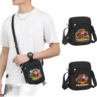 Black shoulder bag with cartoon graphics.