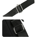 Black bag strap with metal hardware.