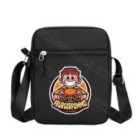 Black shoulder bag with cartoon graphic.