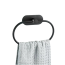 Black oval towel ring with gray towel.