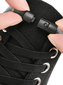 Black no-tie shoelace clasp.