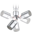 Chrome faucet aerator with rotating nozzles.
