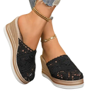 Black crochet wedge mules.