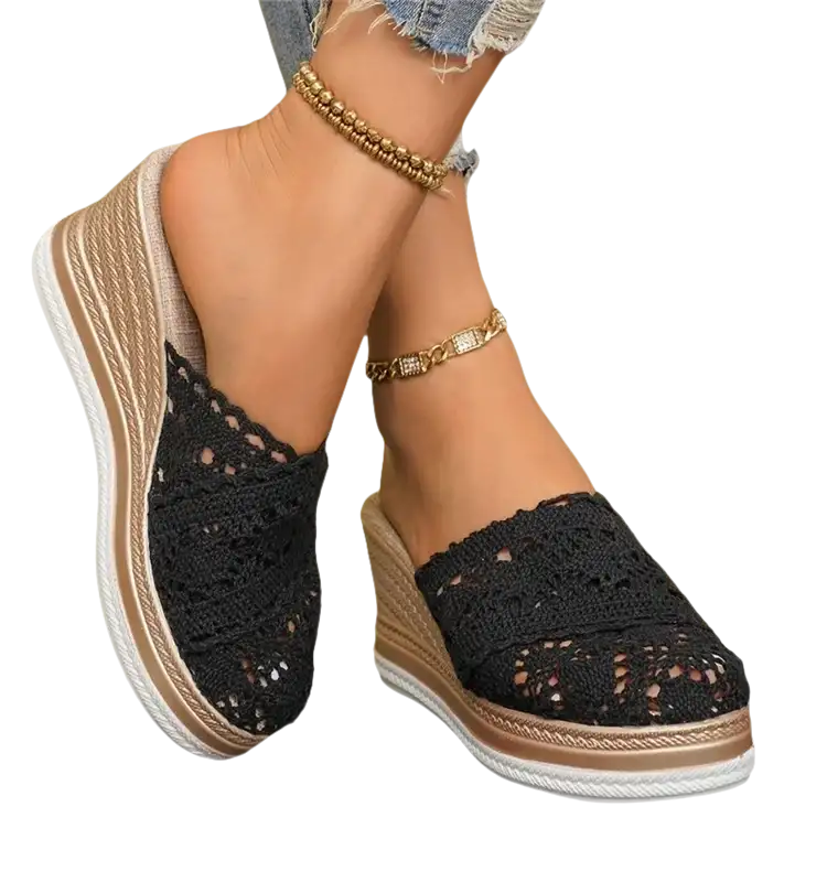 Black crochet wedge mules.