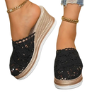 Black crochet wedge mules.