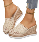 Lace-covered wedge sandals.