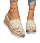 Lace-covered wedge mule.