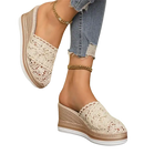 Lace-covered wedge mule shoes.