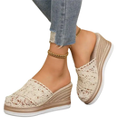 Lace-covered wedge mule shoes.