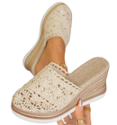 Lace-covered wedge sandals.