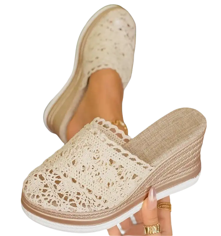 Lace-covered wedge sandals.