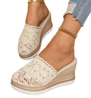 Lace wedge mule sandals.
