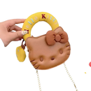 Brown Hello Kitty purse with yellow handle.
