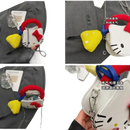 Hello Kitty purse with yellow charm.