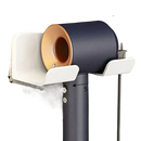 Wall-mounted hair dryer holder.