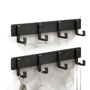 Black four-hook wall rack.