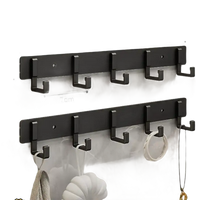 Black five-hook wall rack.