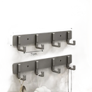 Silver four-hook wall rack.