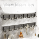 Silver-colored, eight-hook wall racks.