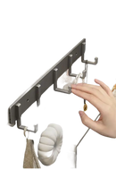 Gray wall-mounted coat rack with multiple hooks.
