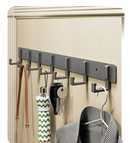 Gray wall-mounted coat rack with multiple hooks.