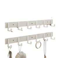 White six-hook wall racks.