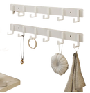 White wall-mounted coat rack.