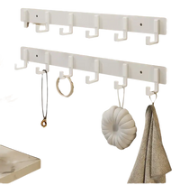 White wall-mounted coat rack.