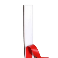 White plastic trim with red adhesive backing.