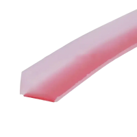 Translucent red-tinted adhesive strip.