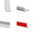 White adhesive shower water barrier.