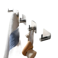 Stainless steel adhesive wall hooks.