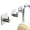 Adhesive metal wall hooks.