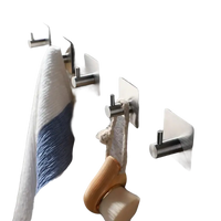 Adhesive metal wall hooks.
